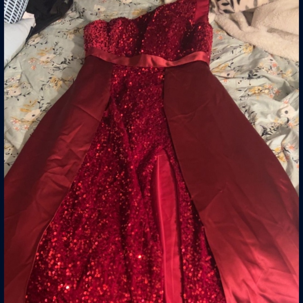 Red sequin dress with an attached silk skirt.